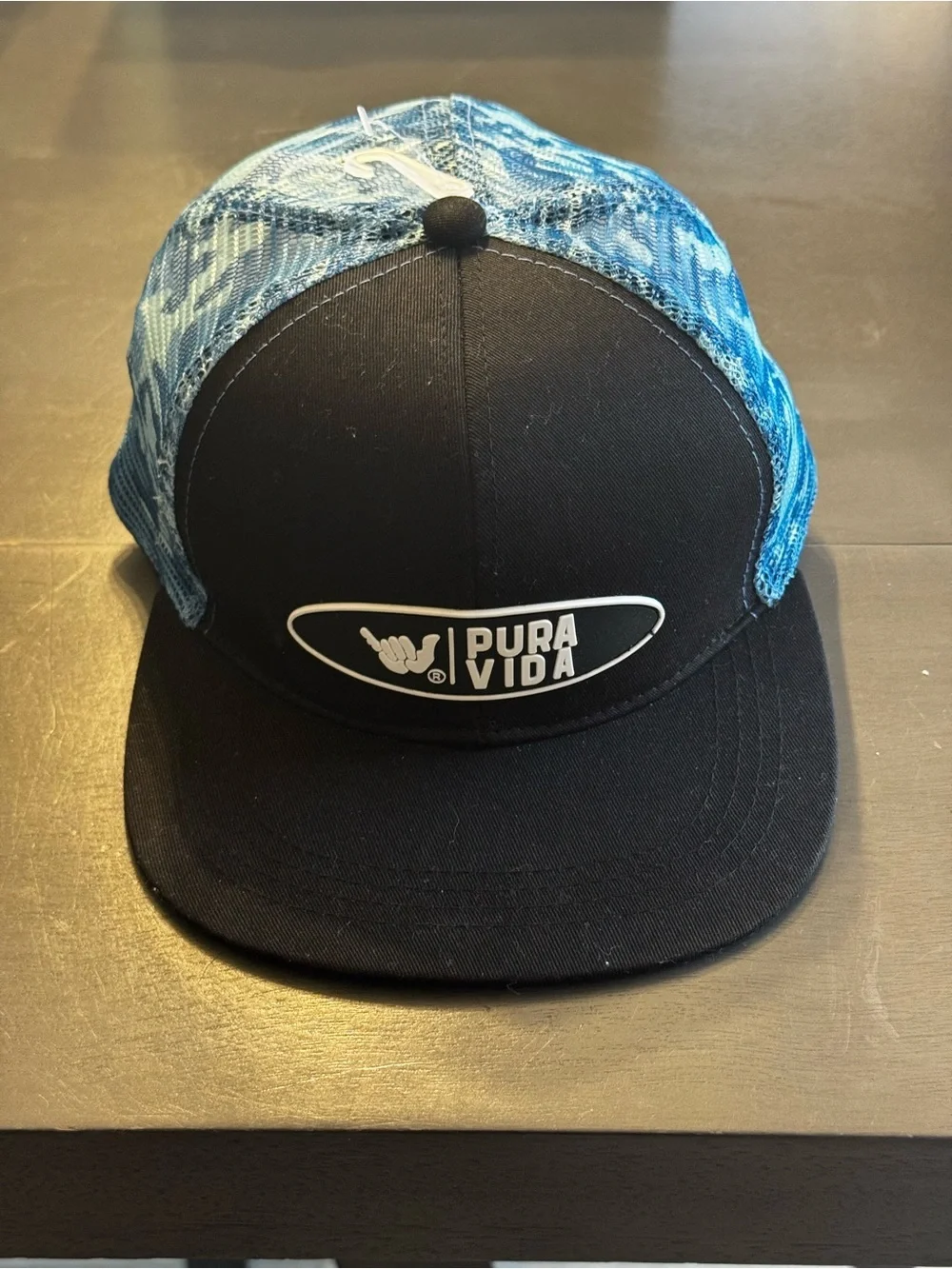NWOT Pura Vida black & blue trucker hat, blue tie-dye mesh, adjustable band.